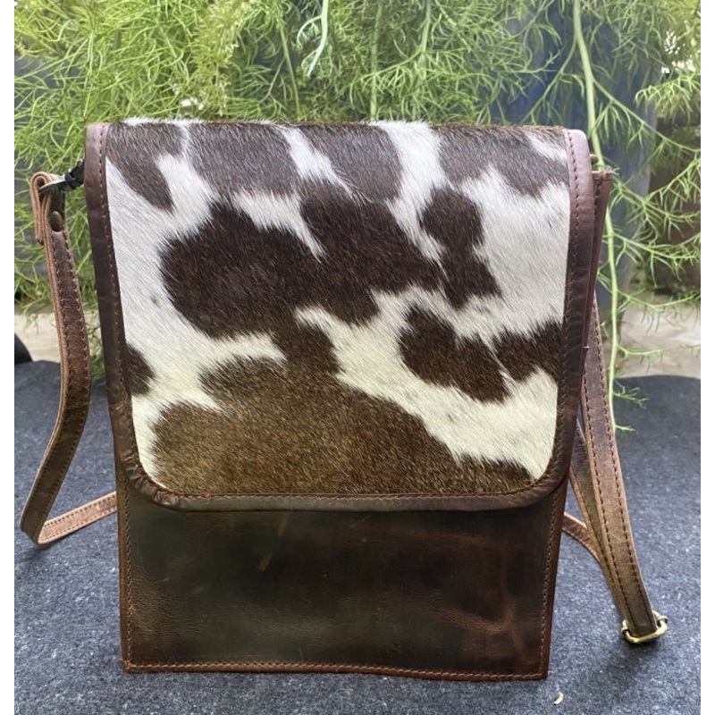 Klassy Cowgirl Leather Crossbody Bag with hair on cowhide and adjustable crossbody strap