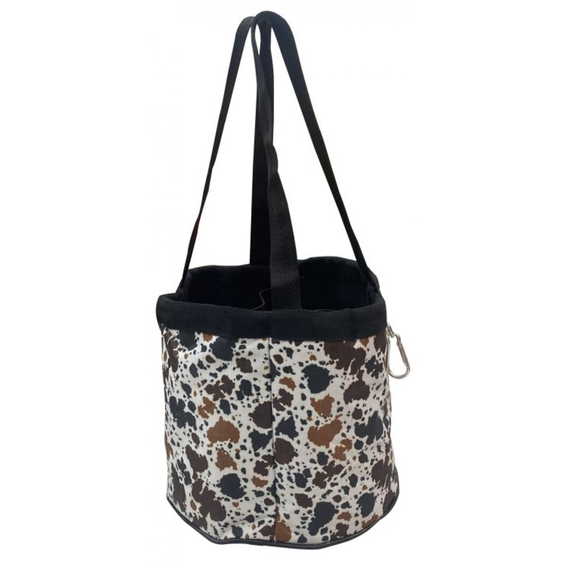 Showman Cow print durable nylon grooming tote with 4 large pockets that fit most size brushes